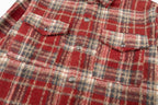 Red plaid shirt jacket with chest pockets, flap details, and small round buttons