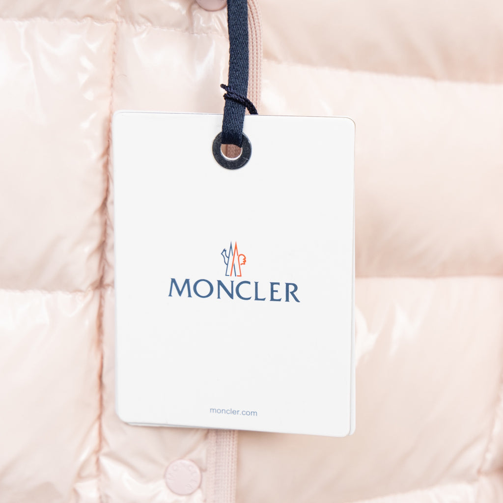 Light pink hooded puffer jacket with Moncler hang tag
