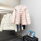 Long hooded puffer jacket, light pink, front zip and hood with logo patches
