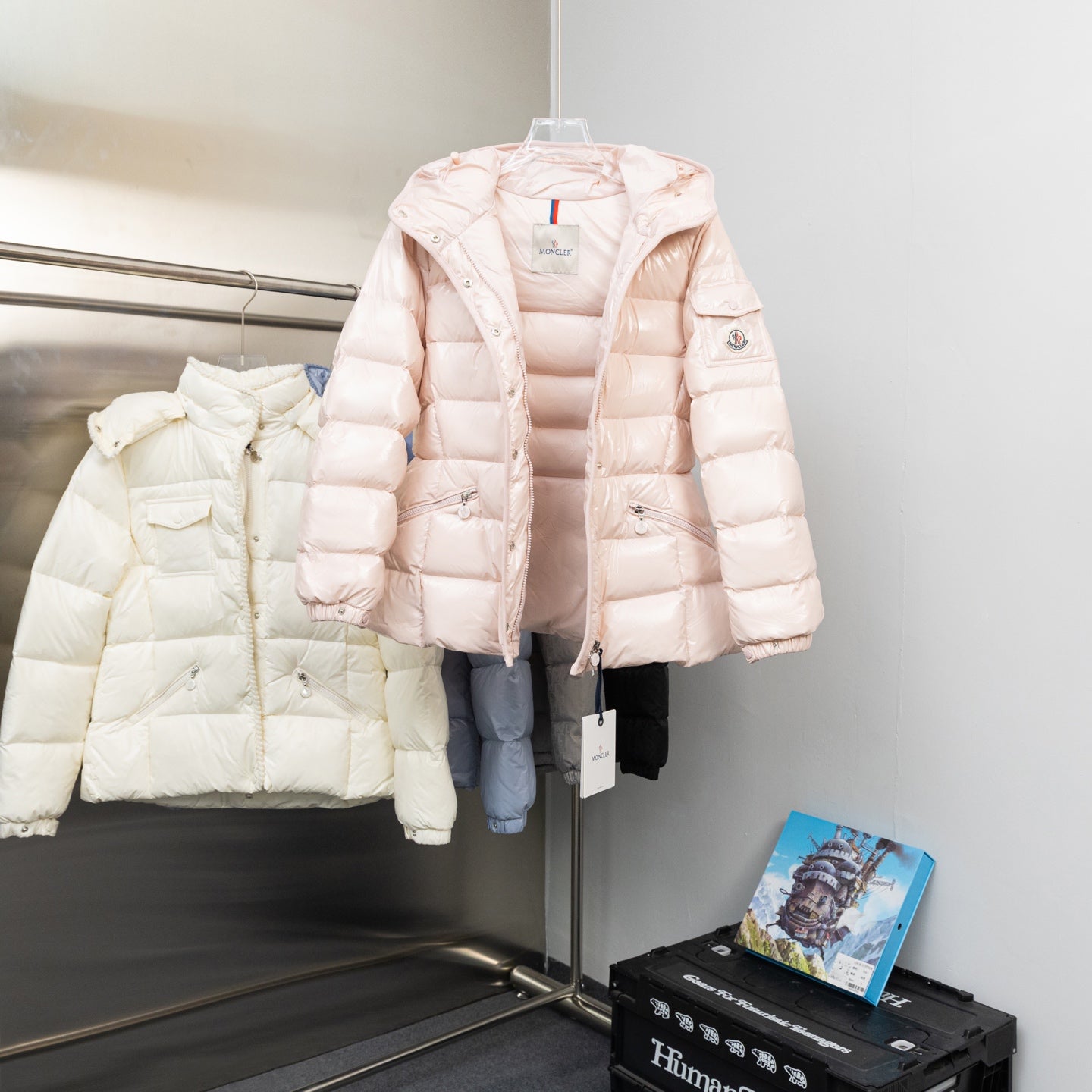 Long hooded puffer jacket, light pink, front zip and hood with logo patches