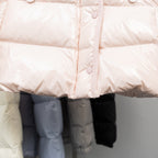 Light pink Moncler long puffer jacket front with buttoned placket