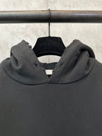 Black Dior hood with thick hood opening and soft neck area.