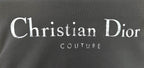 Black fabric with Christian Dior and COUTURE logo print.