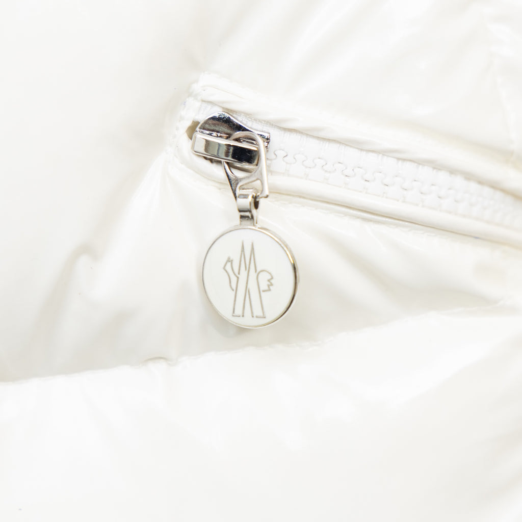 Moncler long puffer jacket, white zipper with round logo charm and metal pull