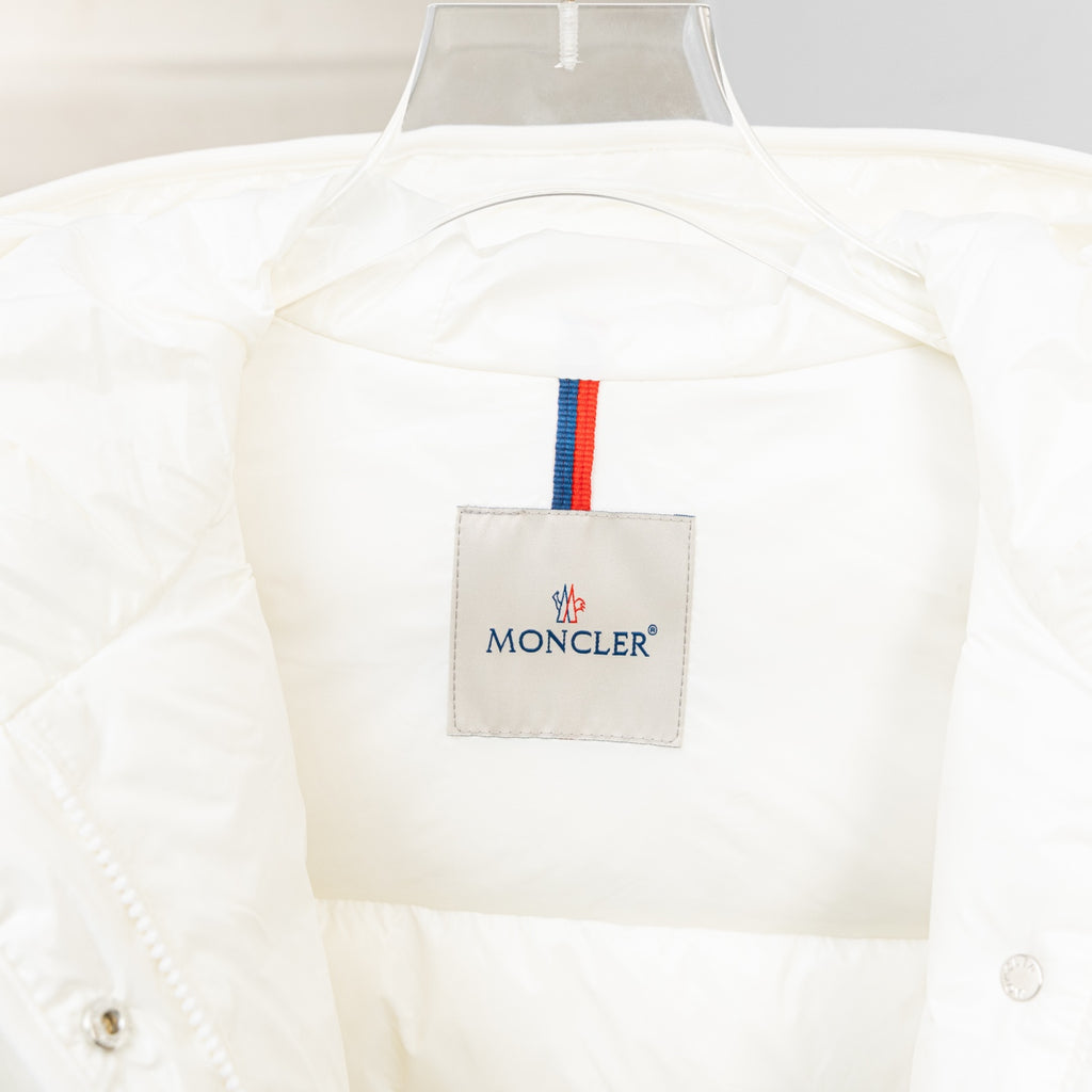 Moncler long white puffer jacket, front logo patch with red-blue stripe