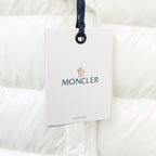 Moncler long white puffer jacket, white hang tag with Moncler logo