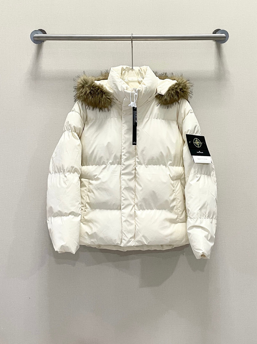 White puffer jacket with faux fur hood and full front zipper