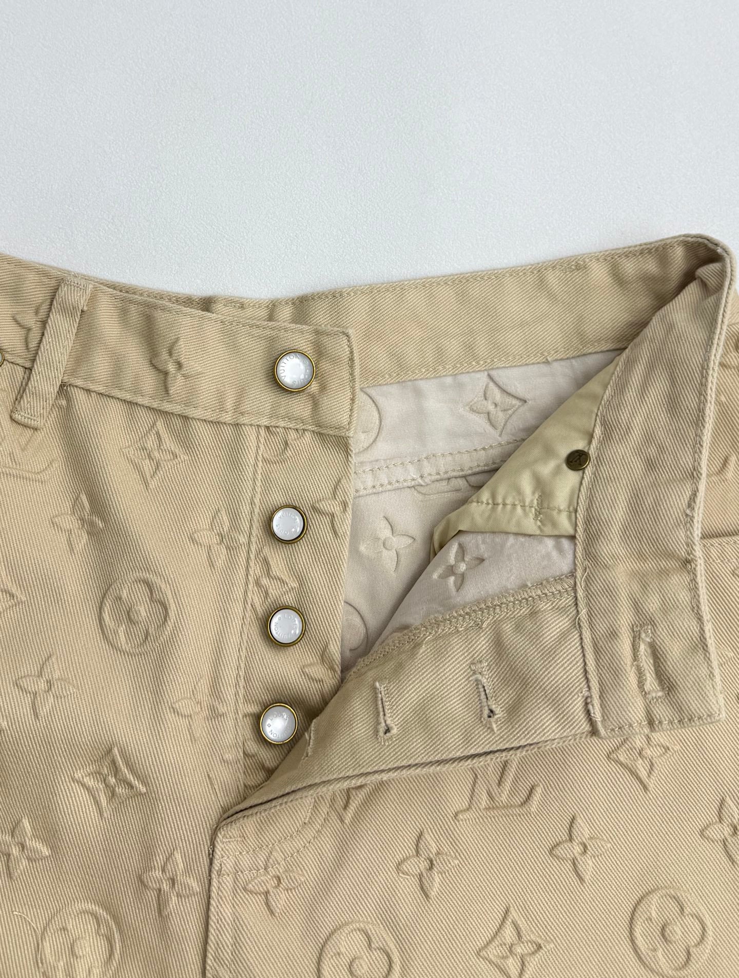 Beige Louis Vuitton monogram pants, snap button waistband detail