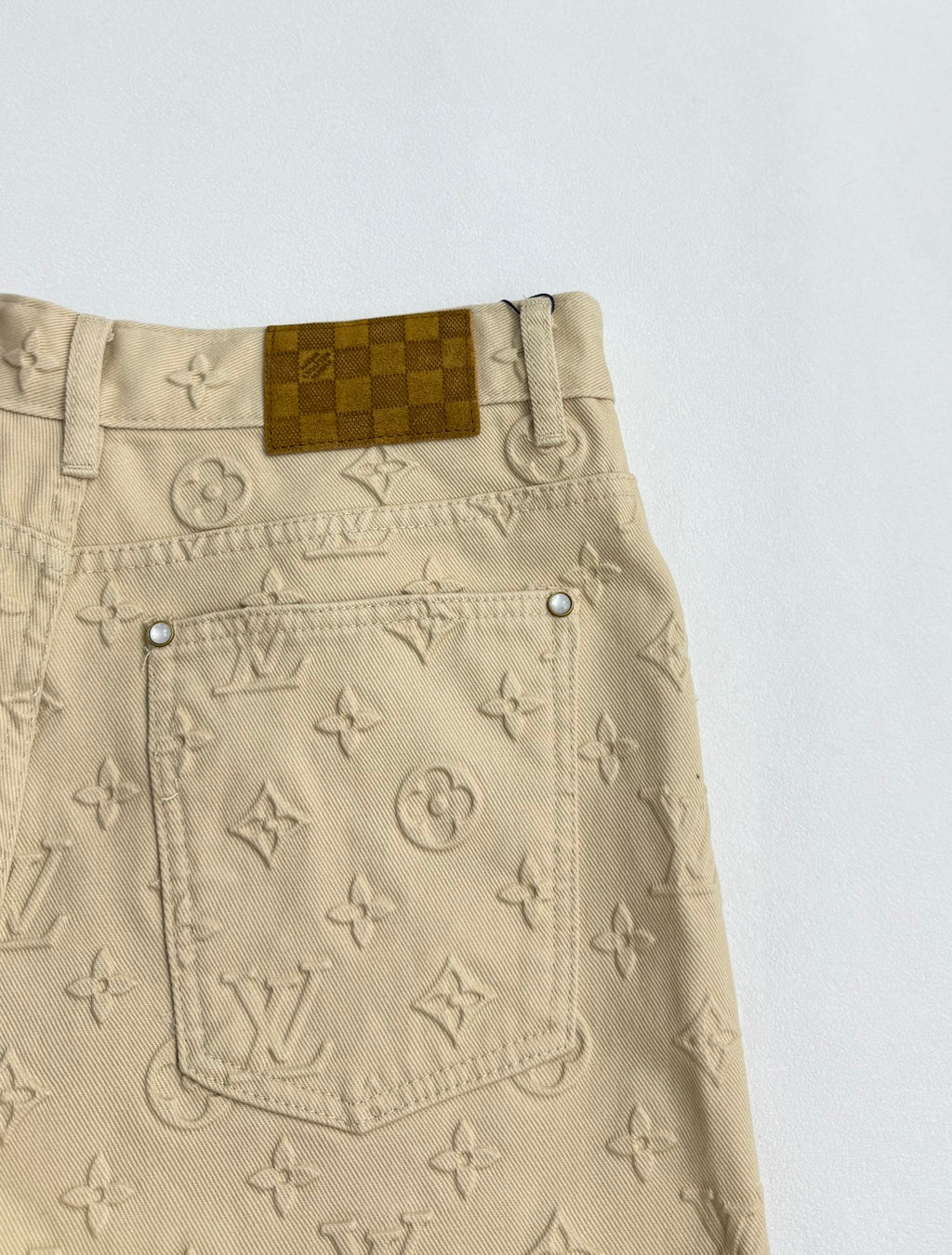 Beige Louis Vuitton monogram pants with flap pocket and logo patch