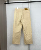 Beige Louis Vuitton monogram wide-leg pants with belt loops and back pockets