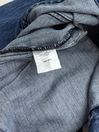 Denim jacket inside neckline with woven care label tag
