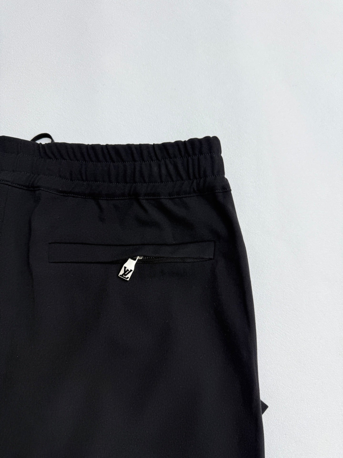Louis Vuitton black pants with elastic waist and hidden pocket