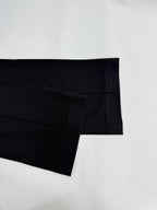 Louis Vuitton black tapered pants with cuffed hem opening