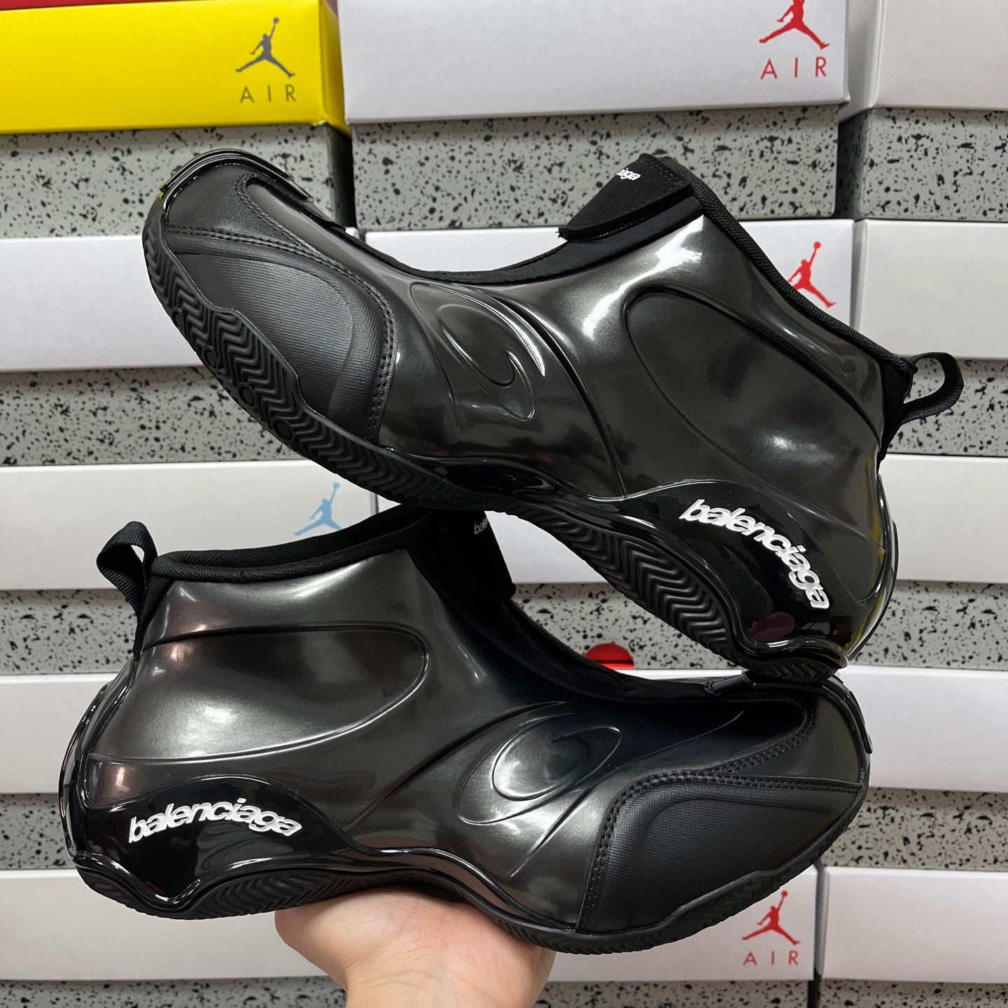 Pair of unisex black glossy sneakers with Balenciaga logo and sock collar