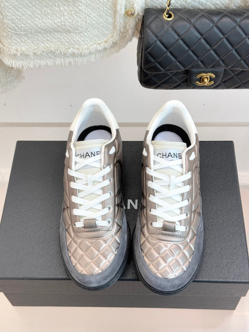Ladies sneakers front view in metallic beige with white laces and white rubber soles