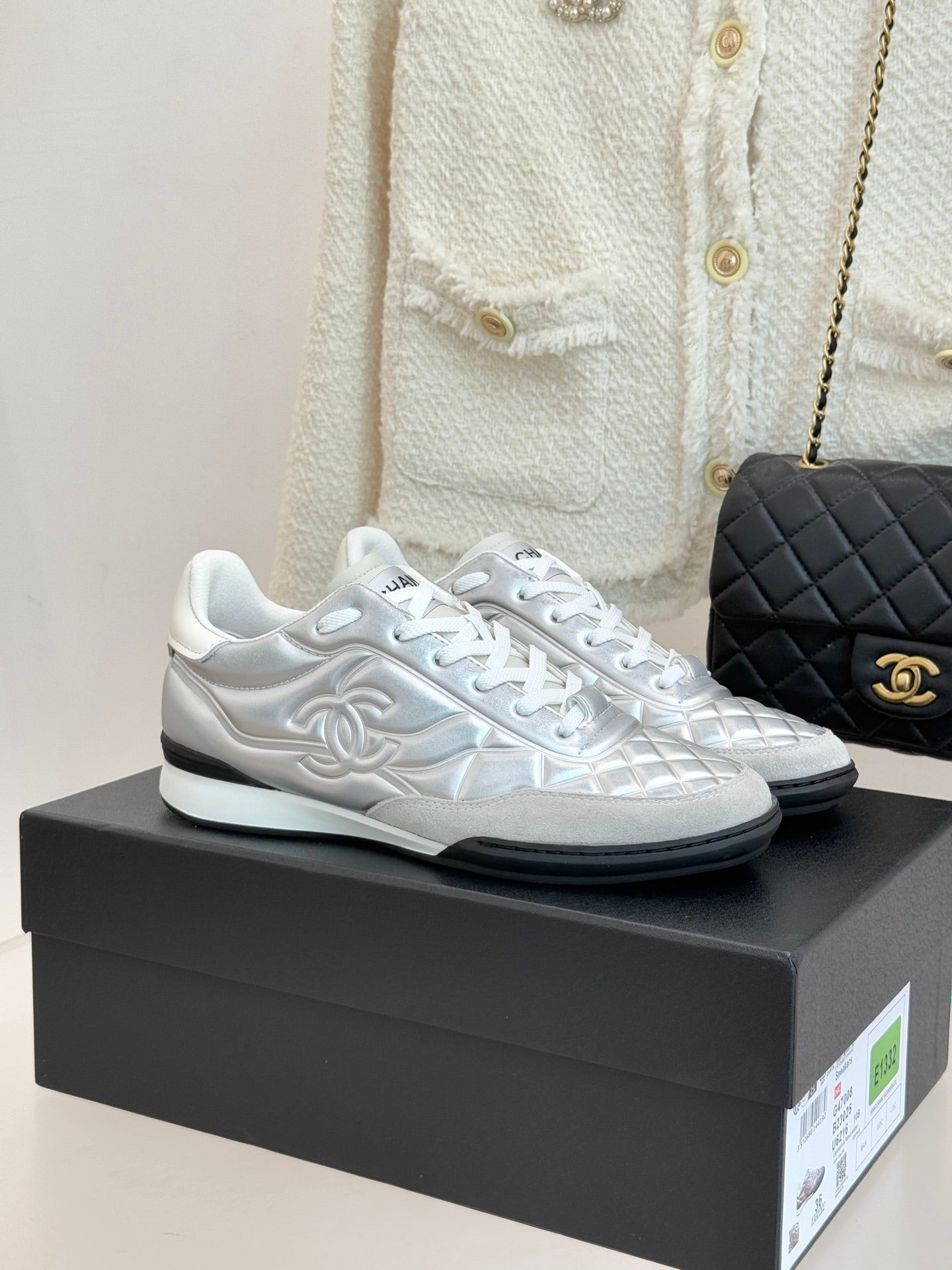 Chanel ladies white sneakers with quilted side panels and white laces
