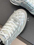 Chanel ladies white sneaker toe and outsole tread, textured grid pattern