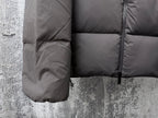 Long padded jacket side panel with quilted sections and zipper, dark gray