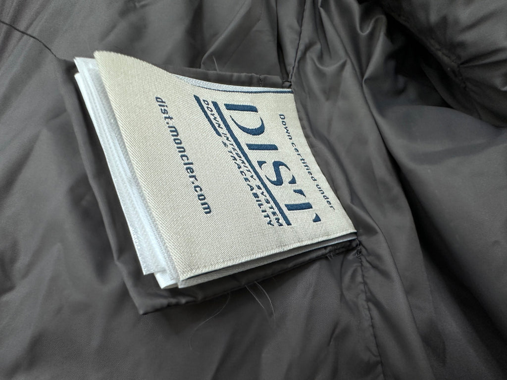 Moncler care label on dark gray quilted lining