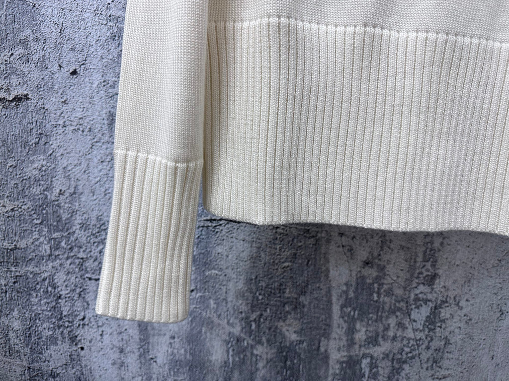 Dior knit sweater cuff and lower sleeve with ribbed knit and stripe band