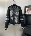 Louis Vuitton leather-look varsity jacket in dark navy with white striping and patches