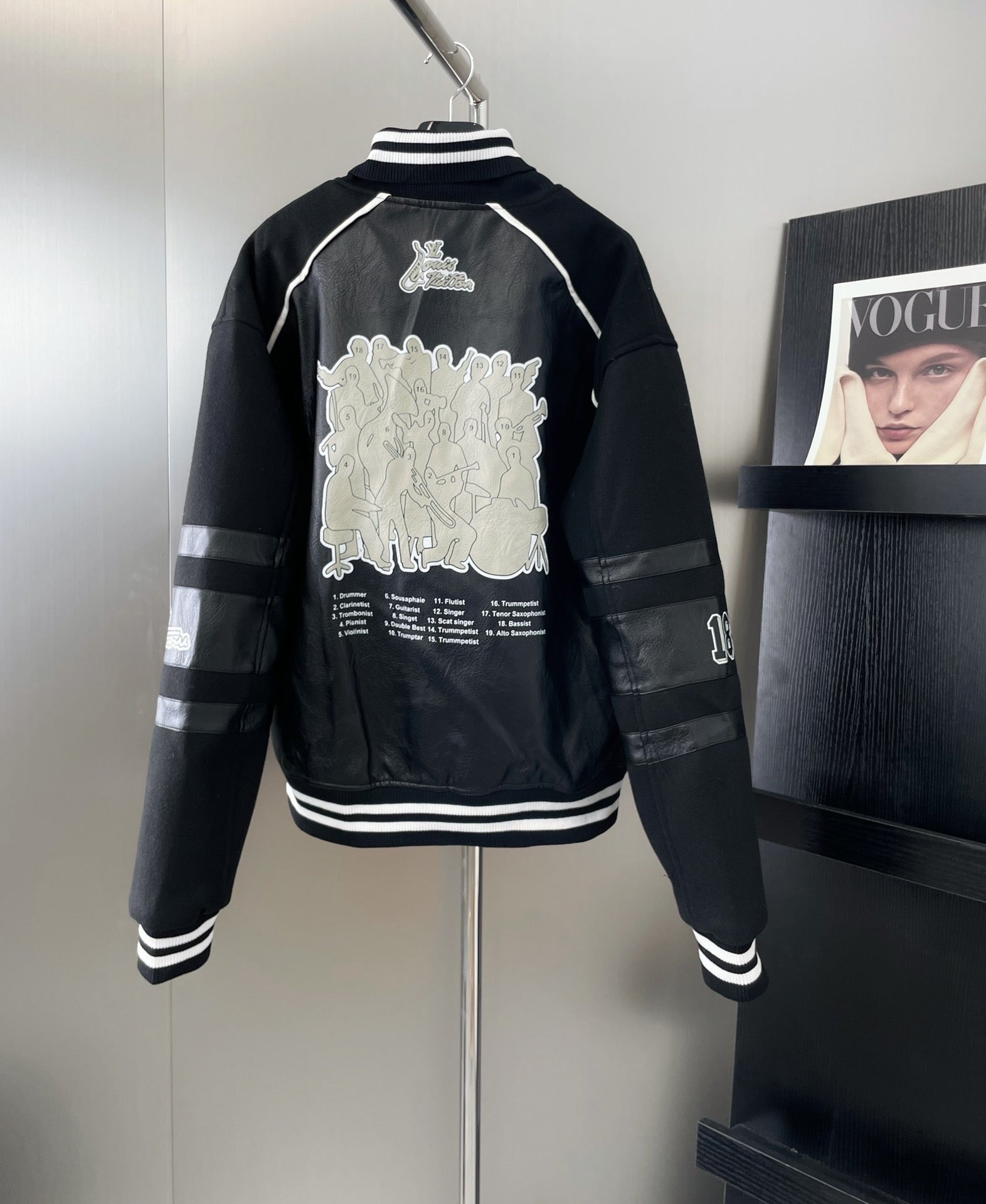 Louis Vuitton leather-look varsity jacket, back graphic with white striping and ribbed hem