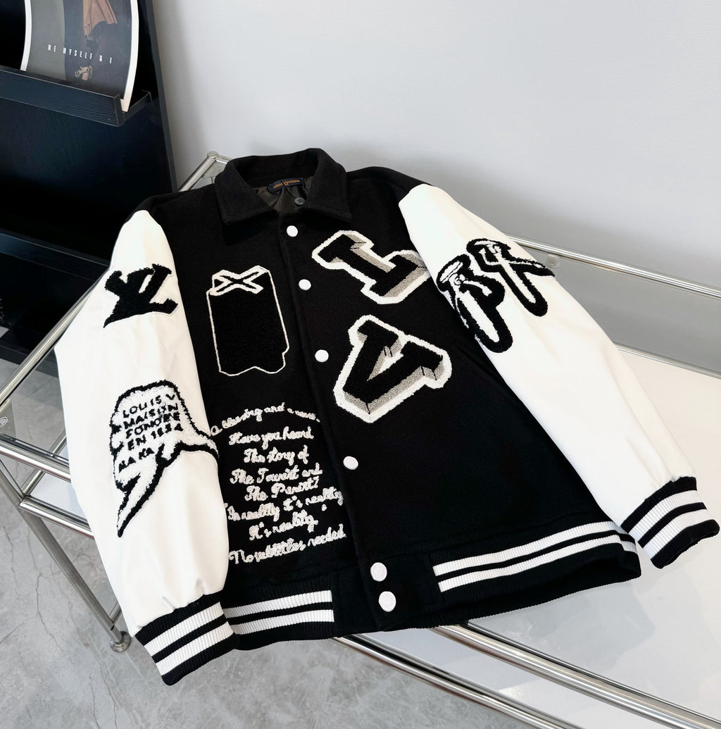 Black and white varsity-style button-up jacket with front graphic and striped ribbed trim