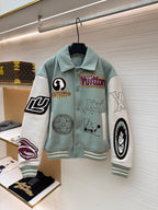 Long-sleeve Louis Vuitton jacket, light blue with embroidered patches and snap buttons