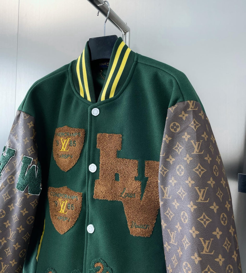 Green Louis Vuitton jacket front with embroidered patches and snap buttons