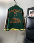 Green Louis Vuitton jacket back with large embroidered text and striped cuffs