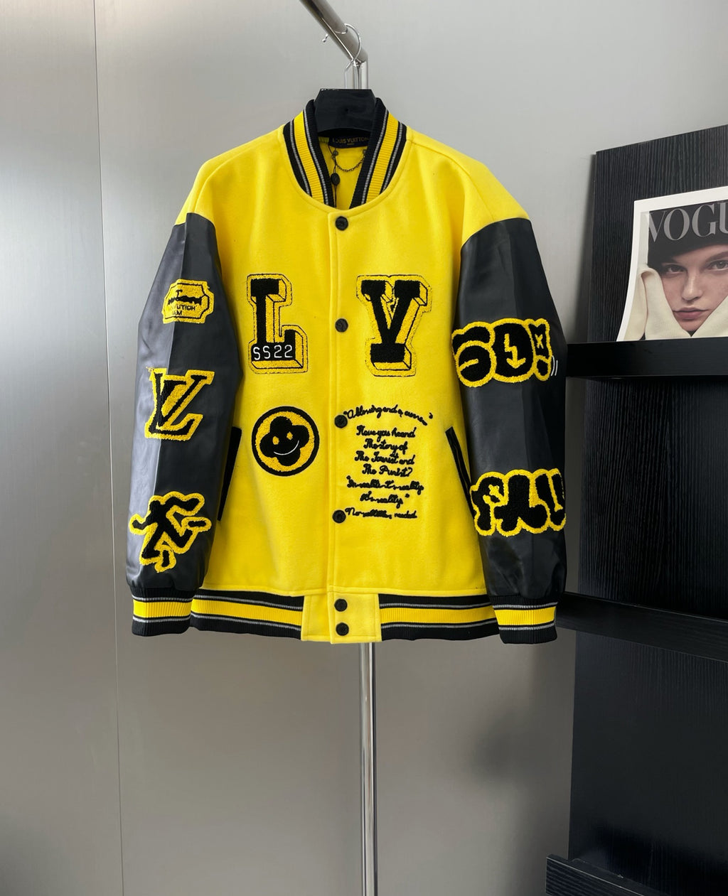 Yellow and black long Louis Vuitton jacket with varsity collar, snap front, graphic patches