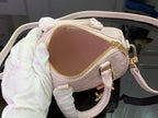 Louis Vuitton light pink mini bag with gold zipper and inner pocket view