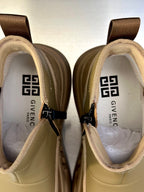 Givenchy sneakers close-up of interior label and laces, pale yellow and tan