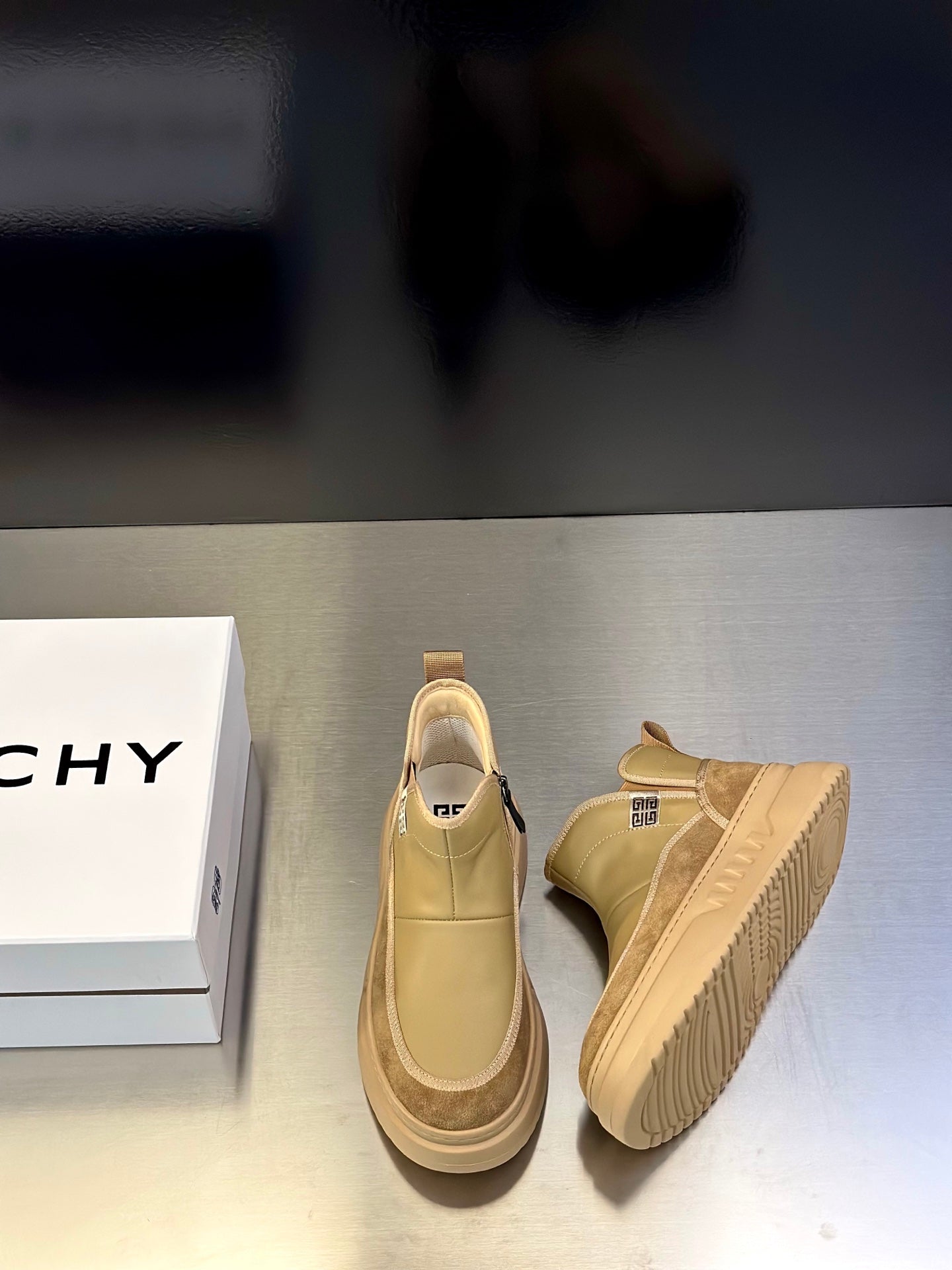 Givenchy sneakers pale yellow with tan accents, side-by-side