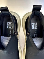 Dark gray ankle sneakers with zip, padded collar, and Givenchy text lining