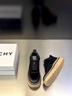 Black lace-up Givenchy sneakers with logo patch and cream platform outsole