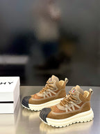 Moncler sneakers pair, tan suede uppers with beige laces and white ridged platform sole