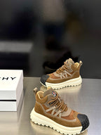 Moncler sneakers in tan and beige with patterned toe caps and white platform sole