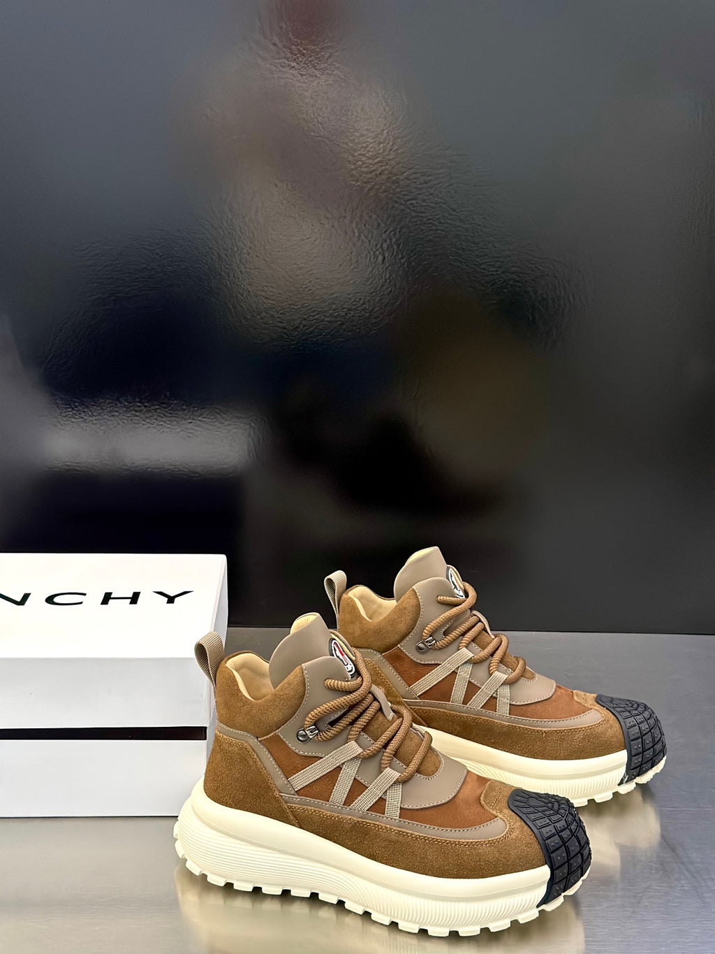 Moncler sneakers in tan with beige laces, cushioned collar, and thick white outsole