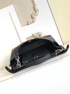 Fendi handbag underside view with zipper opening and dual shoulder straps