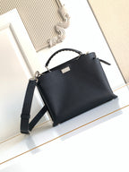 Fendi structured leather handbag with top handle and shoulder strap, black.