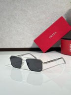Prada square sunglasses with dark tinted lenses and silver metal frame