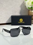Versace sunglasses with black frames and dark lenses