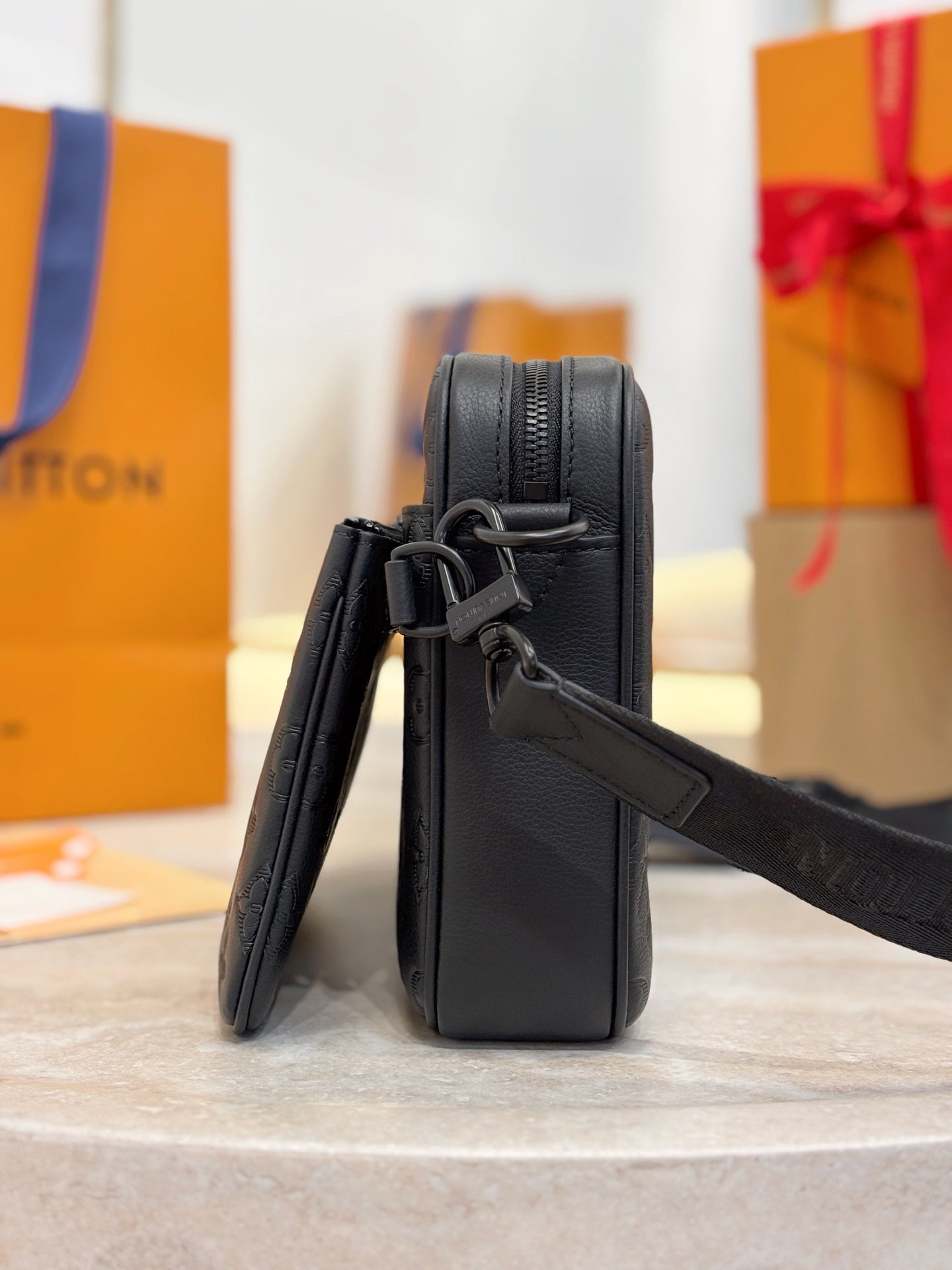 Louis Vuitton black monogram crossbody bag, front side with short carry handle and strap