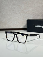Black eyeglasses with blue-tinted lenses and gold-tone center hardware