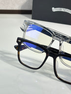 Blue-tinted lens eyeglasses with clear frame and reflective metal temples