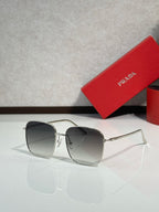 Prada sunglasses with silver frame and dark gradient lenses, rectangular aviator style