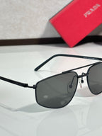 Prada aviator sunglasses close-up, black frame with dark tinted lens