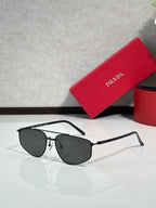 Prada aviator sunglasses with black frame and dark tinted lenses