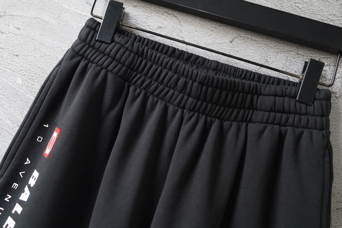 Balenciaga elastic-waist pants with side logo panel, black